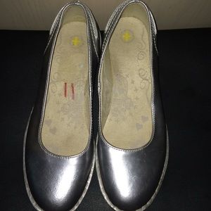 Gently used metallic silver flats by Dr. Martens